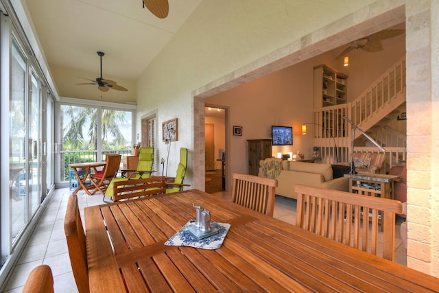 sunroom with a ceiling fan