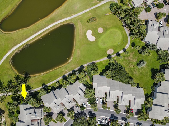 birds eye view of property featuring a water view, a residential view, and golf course view