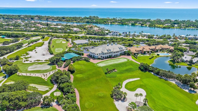 bird's eye view with golf course view and a water view