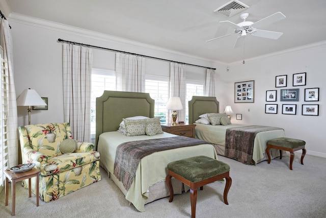 bedroom with light carpet, baseboards, visible vents, a ceiling fan, and ornamental molding