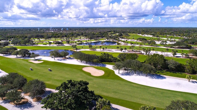 bird's eye view with a water view and golf course view