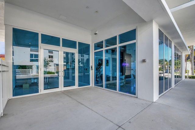 entrance to property featuring french doors