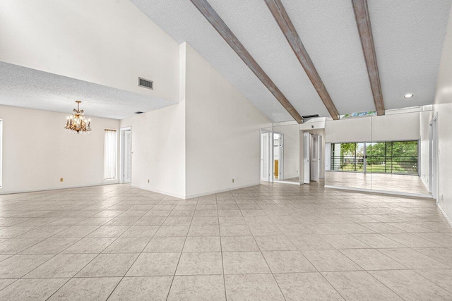 unfurnished living room with light tile patterned floors, high vaulted ceiling, a notable chandelier, visible vents, and beam ceiling