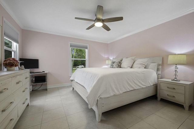 bedroom with baseboards, light tile patterned flooring, a ceiling fan, and crown molding