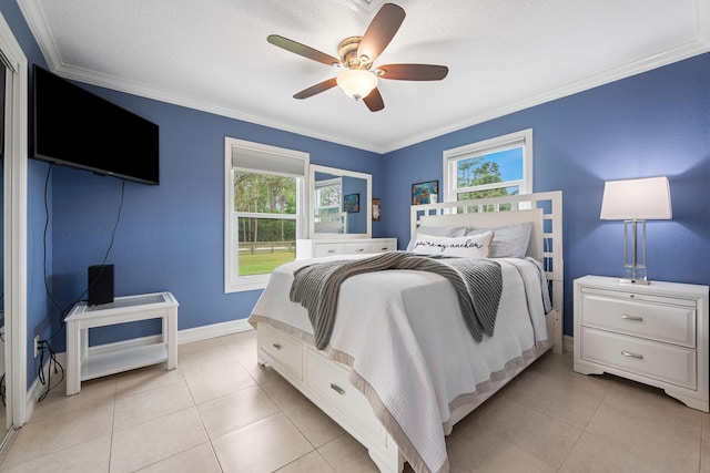 bedroom with multiple windows, crown molding, and light tile patterned floors