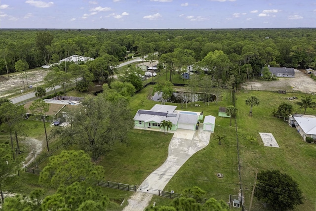 aerial view with a wooded view