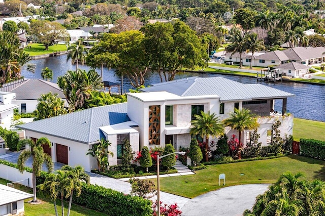 bird's eye view with a residential view and a water view