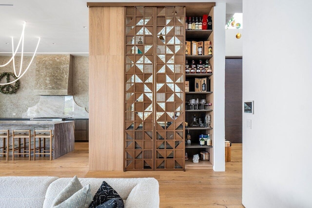 wine area with wood finished floors