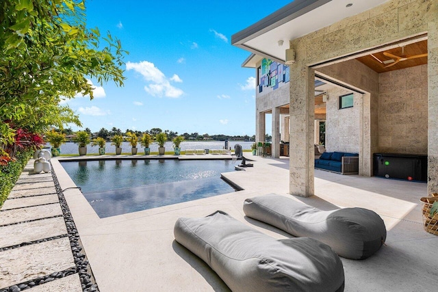 outdoor pool featuring a patio area