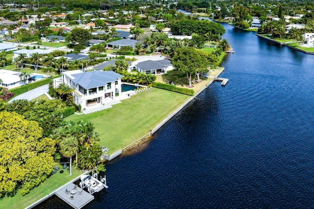 bird's eye view featuring a residential view and a water view