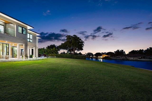 view of yard with a water view