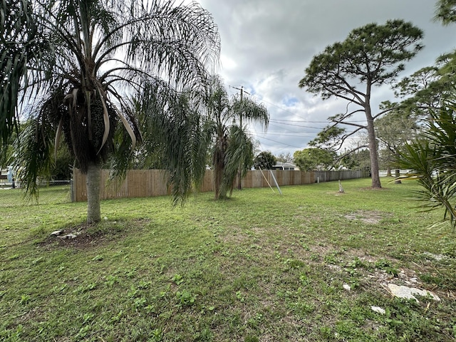 view of yard with fence