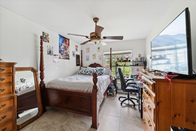 bedroom featuring ceiling fan and light tile patterned floors