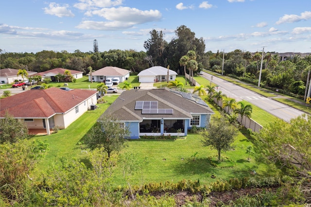 drone / aerial view with a residential view