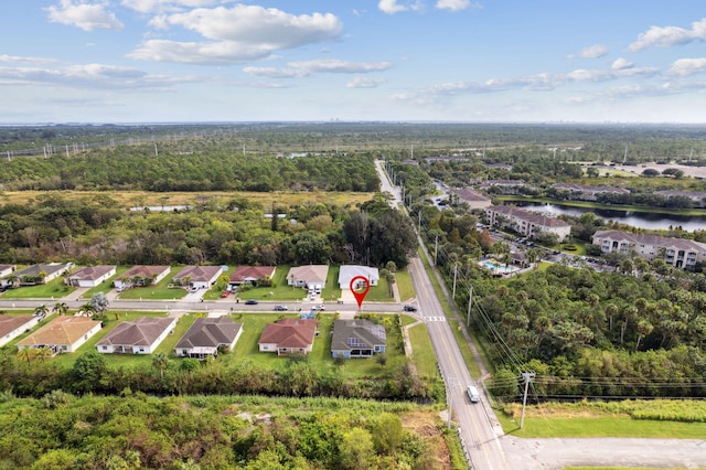 aerial view featuring a residential view and a water view