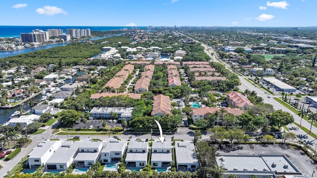 bird's eye view featuring a residential view and a water view