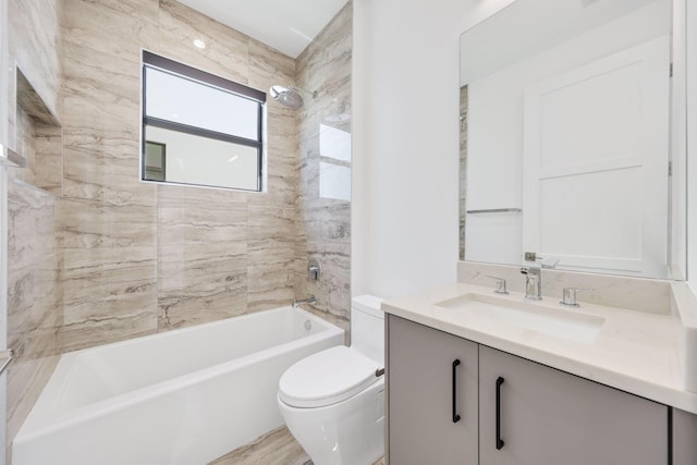 full bath featuring tub / shower combination, vanity, and toilet