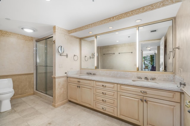 100 Beach Rd Unit 301, Tequesta, FL 33469 - full bath featuring toilet, a shower stall, double vanity, and recessed lighting