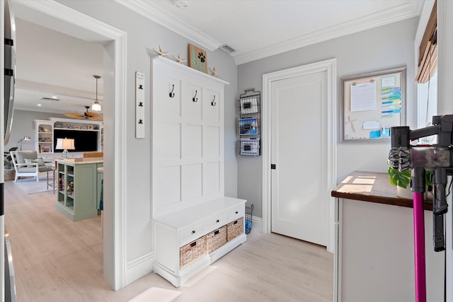 mudroom with ceiling fan, visible vents, light wood finished floors, and ornamental molding