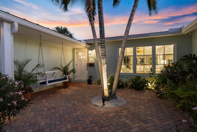 exterior space with stucco siding