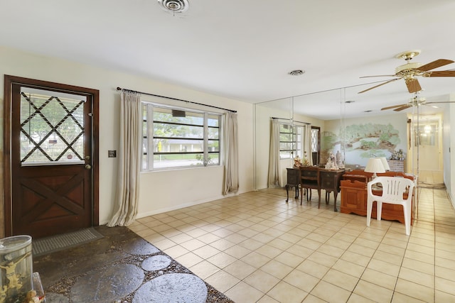 foyer with visible vents and light tile patterned floors