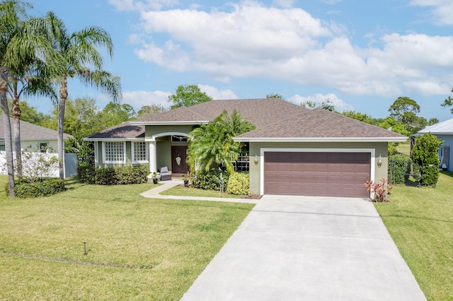 ranch-style house featuring a garage, stucco siding, driveway, and a front lawn