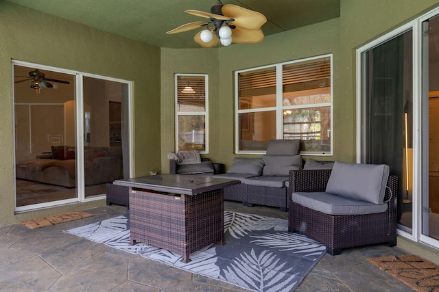 view of patio featuring outdoor lounge area and ceiling fan