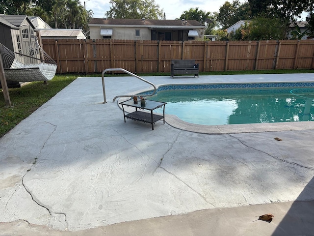 7430 Atlanta St, Hollywood, FL 33024 - view of swimming pool featuring a patio, fence, and a fenced in pool