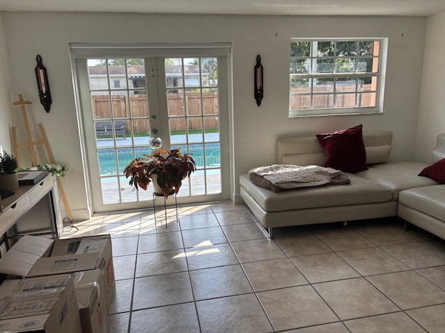 7430 Atlanta St, Hollywood, FL 33024 - living area with light tile patterned floors and french doors