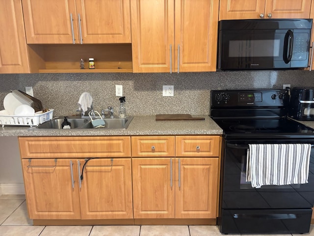 7430 Atlanta St, Hollywood, FL 33024 - kitchen featuring light tile patterned floors, tasteful backsplash, brown cabinetry, a sink, and black appliances