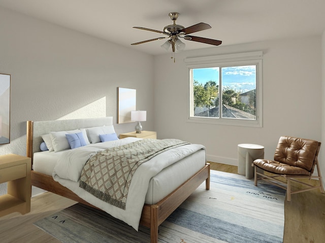 bedroom featuring baseboards, a ceiling fan, and light wood-style floors