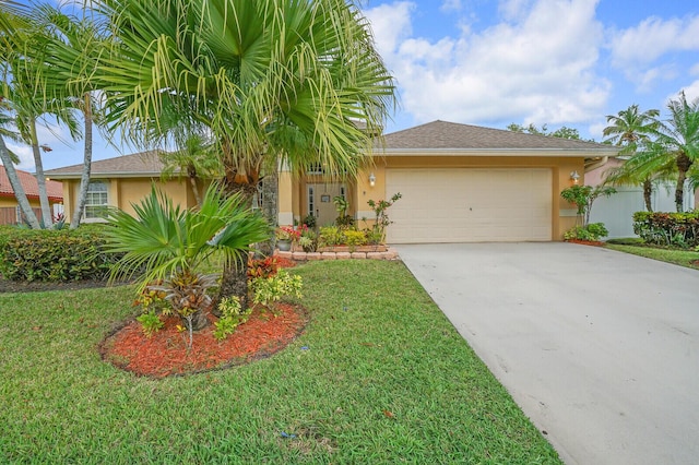 view of front of property with stucco siding, an attached garage, driveway, and a front lawn