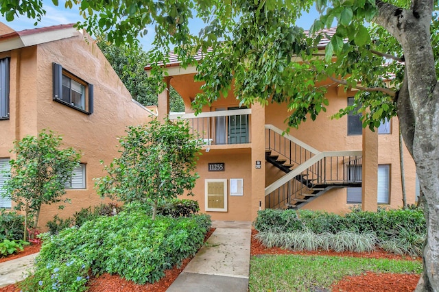 view of property with stairs