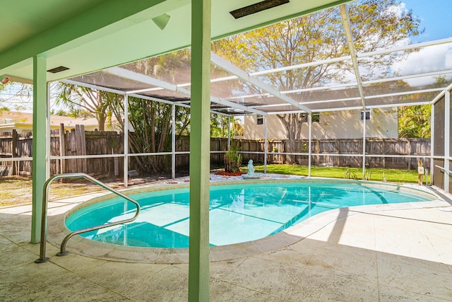 view of pool with a lanai, a fenced backyard, a fenced in pool, and a patio