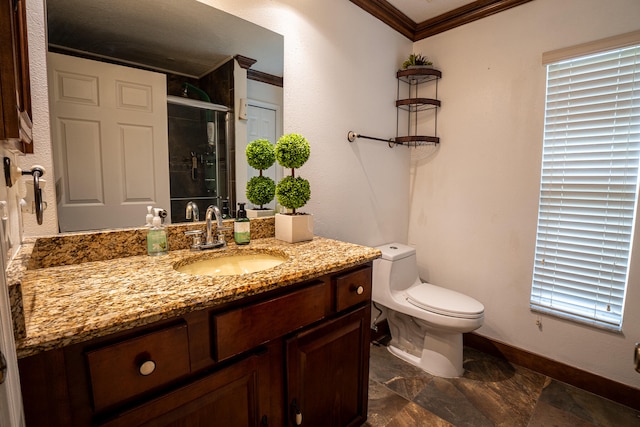 bathroom featuring toilet, vanity, baseboards, a shower stall, and crown molding