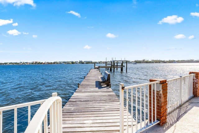 dock area featuring a water view