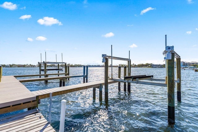 dock area featuring a water view and boat lift