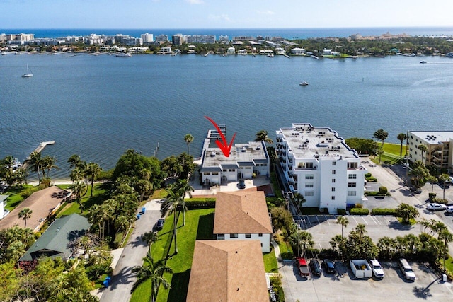 birds eye view of property featuring a water view