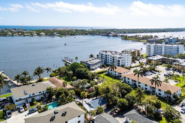 drone / aerial view with a water view