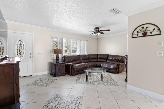 living room featuring light tile patterned floors, visible vents, ornamental molding, and a ceiling fan