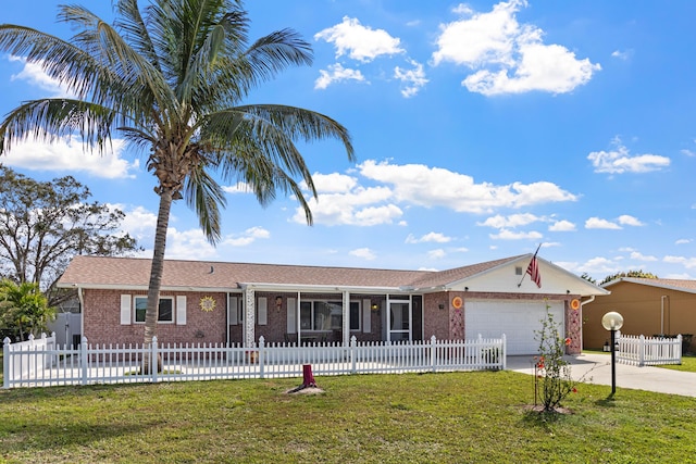 ranch-style home with a fenced front yard, a garage, brick siding, concrete driveway, and a front yard