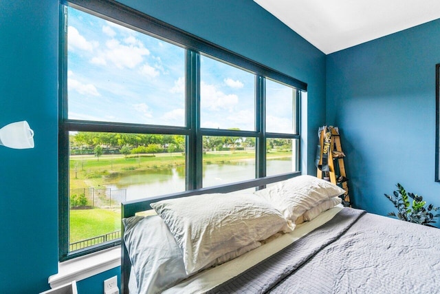 bedroom with a water view