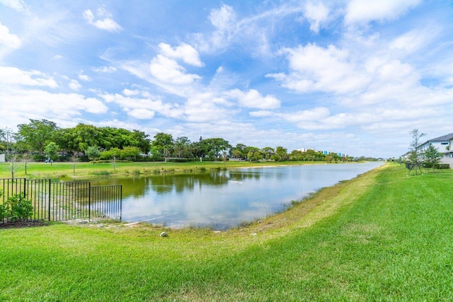 view of water feature with fence