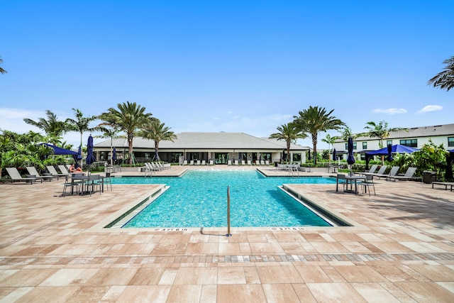 community pool featuring a patio area