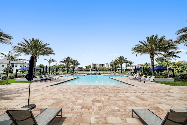 pool with a patio