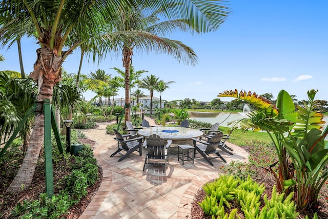 view of patio / terrace with a water view