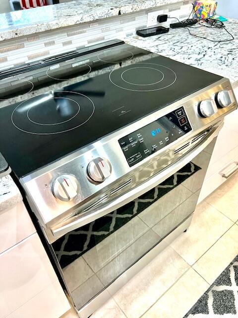 details with stainless steel electric range oven