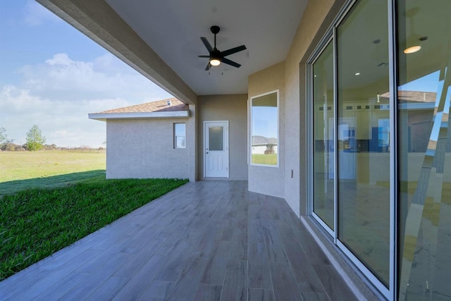 view of patio / terrace with a ceiling fan