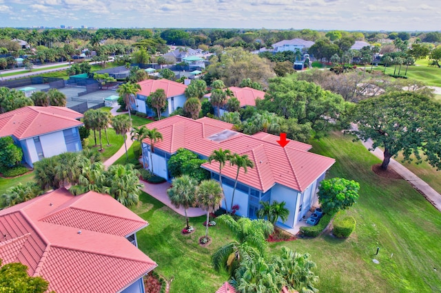 birds eye view of property with a residential view