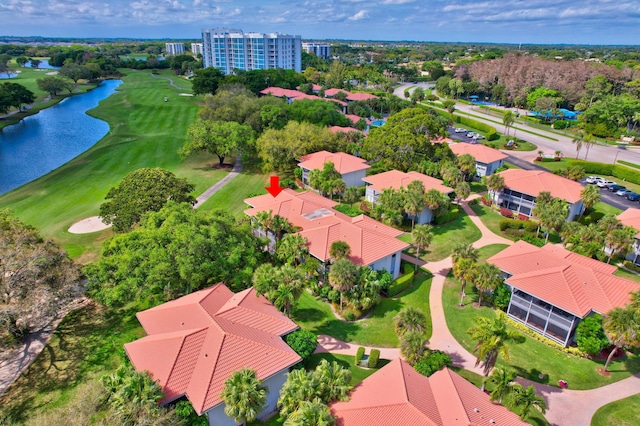 aerial view with a water view and golf course view